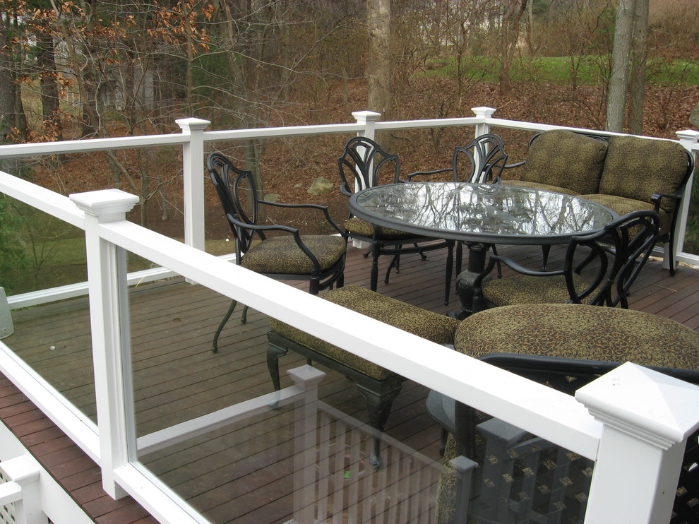 The glass on the deck offers unobstructed views of the backyard.