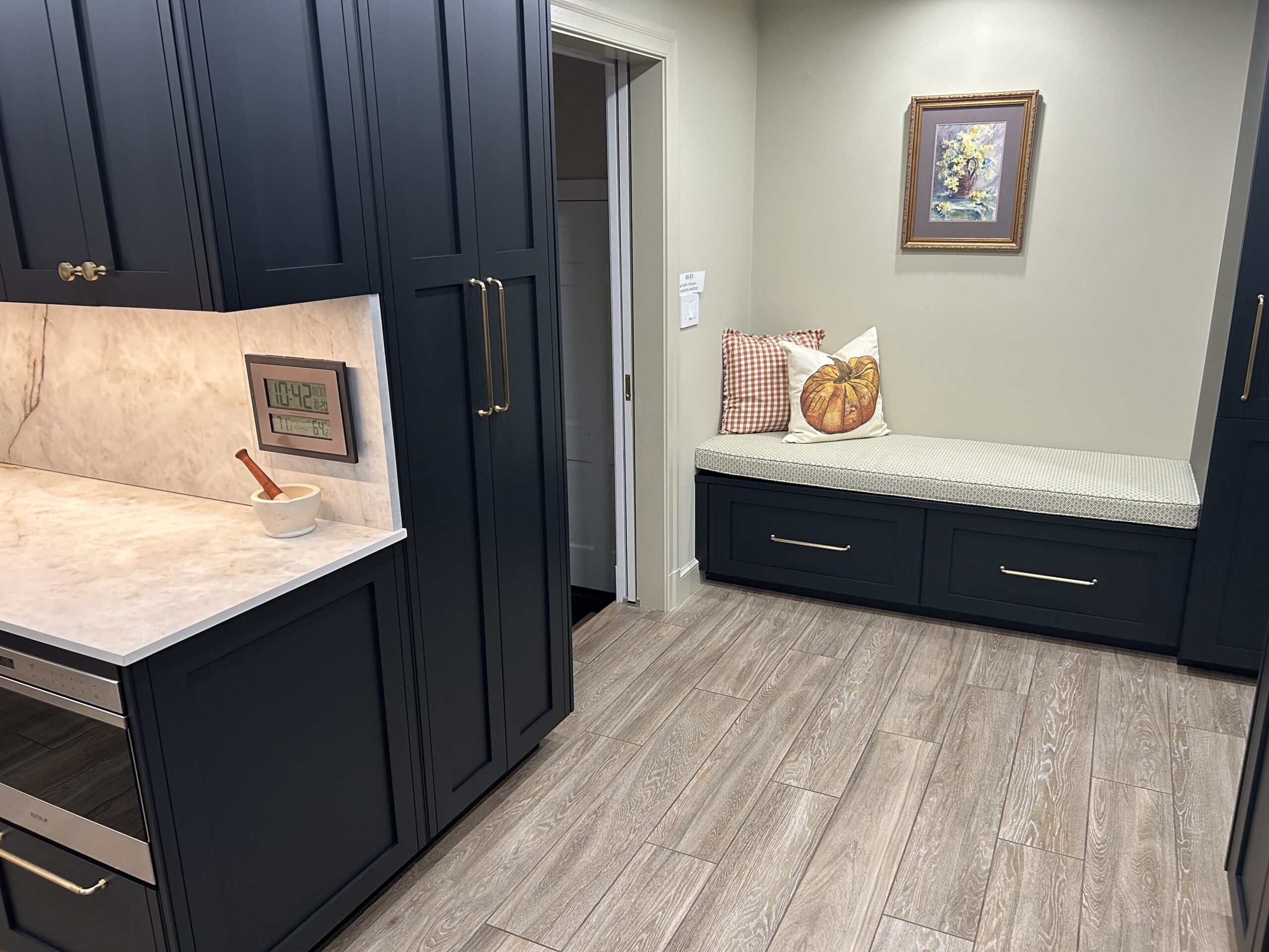 This cushioned nook is perfect for a quick break or a comfortable place for the kids while you are preparing their meals