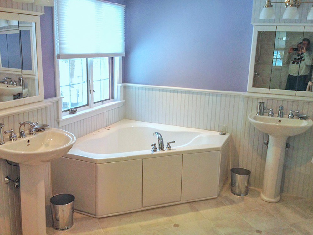 Two sinks and a corner tub!